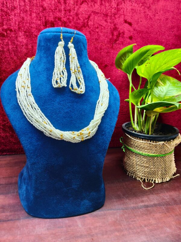 White end golden multi layered necklace